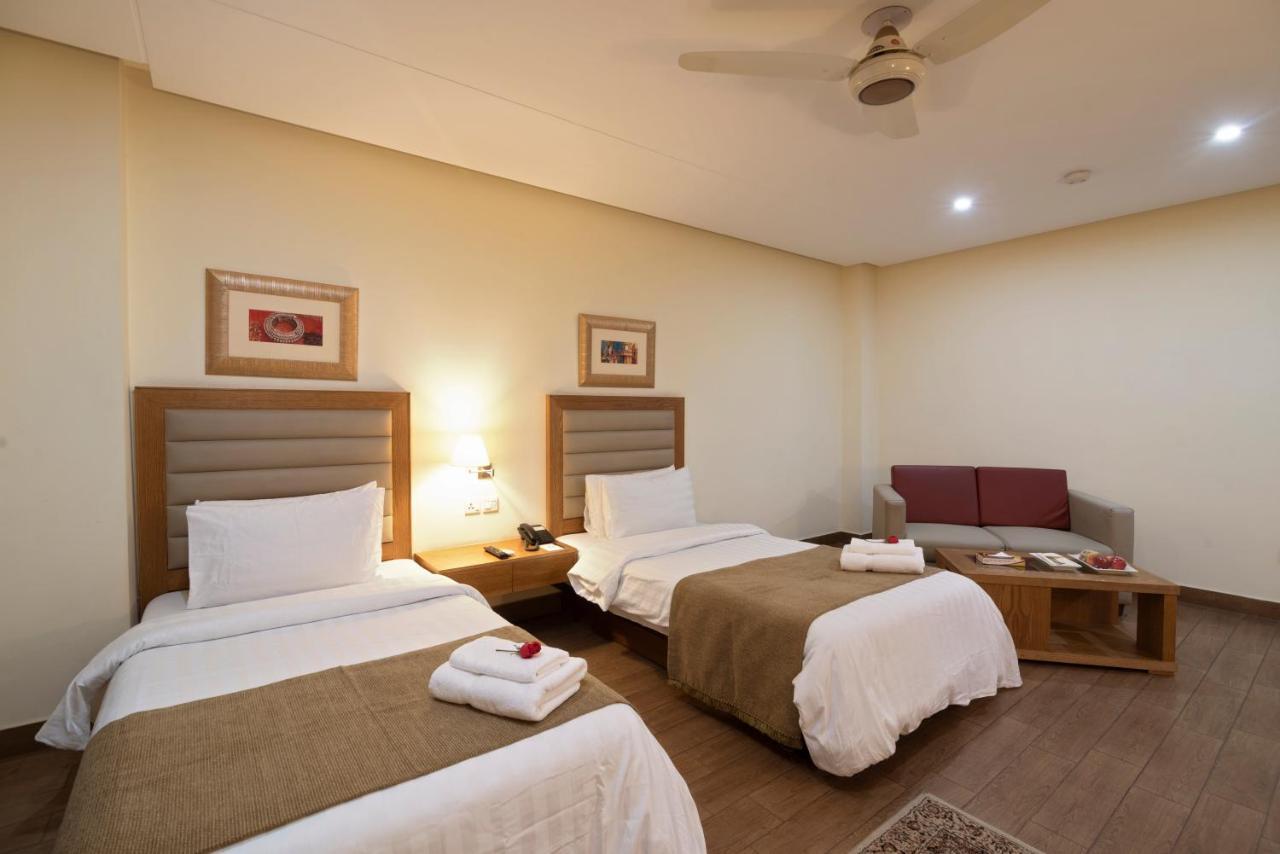 Hotel One Tariq Road Multan Exterior photo